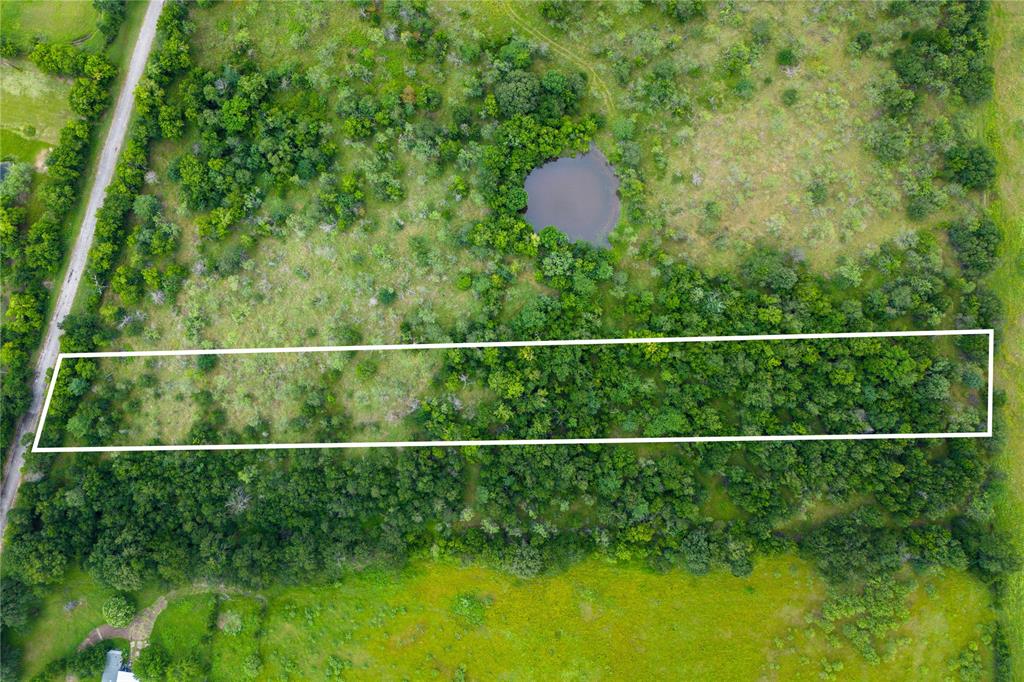 These lots have NO RESTRICTIONS – bring your mobile home, RV, or custom build! These are the lots you've been looking for that are just a stone's throw away from Legion Field (Marlin ISD Stadium), and less than a mile from Walmart and Marlin High School. You're just 25 minutes to Waco and 35 minutes from Temple, located incredibly close to both Highway 6 and Highway 7 for easy commuting. SELLER FINANCING OFFERED!

Each tract offers an incredible variety of mature trees, with some lots featuring pond access or existing improvements. You might be looking for a weekend getaway, a peaceful homestead in the country, or a great investment - let these tracts check your boxes.

Don’t miss out – schedule your visit today and claim your piece of unrestricted Texas land!

Photos for this listing are representative of the entire 30-acre site and not of the specific lot listed for sale. Boundary lines shown are approximate.