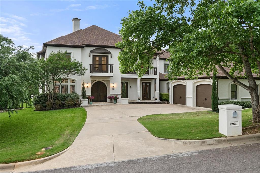 What if I told you that you could have nearly 5,000 square feet, almost an acre, and one of the best views in DFW right in the heart of the Metroplex?

Sitting at the top of a hill, this home gives you something hard to find—space, privacy, and true luxury all in one. With mature trees, incredible views, and quick access to Downtown Fort Worth, Dallas, DFW Airport, Las Colinas, and Arlington’s Entertainment District, this property stands out the moment you arrive.

The Mediterranean design makes a strong first impression with wraparound balconies, beautiful landscaping, and curb appeal that feels like a private retreat. Inside, travertine floors flow throughout the home and outdoor patios, creating seamless indoor-outdoor living. Cedar beams, solid core doors, crown molding, and a stunning cedar ceiling in the formal dining room showcase the craftsmanship throughout.

The gourmet kitchen offers abundant storage, a built in LG refrigerator, a large pantry, and opens into the oversized breakfast area and spacious family room. The formal dining room is perfect for hosting, while upstairs, the game room with a wet bar and ceiling-mounted speakers is built for entertaining.

Features two true primary suites, one downstairs and one upstairs, perfect for guests, multigenerational living, or added flexibility. Both feature oversized closets and spacious spa-like bathrooms.

Outside, enjoy your private retreat with a covered patio, gas log fireplace, built-in gas grill, beautiful fountain, and custom iron fencing around the backyard. Morning coffee overlooking the treetops brings a level of peace that is hard to find this close to the city.

Recent upgrades include a new roof, fresh interior and exterior paint, updated HVAC systems, expanded laundry and pantry space, new carpet, recessed lighting, sprinkler additions, exterior lighting, and a full alarm and camera system.

It's more than a home, it’s the lifestyle most people want but rarely find.
