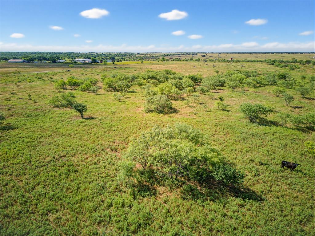 Beautiful 20.89 acre tract with FM 1810 road frontage, fully fenced and featuring a pond, mature trees, and open pasture. The property offers a great balance of cleared land and natural landscape, providing multiple potential homesites and plenty of room for livestock, recreation, or agricultural use.
Currently ag exempt, this versatile property offers endless possibilities for those seeking country living, investment potential, or a future homesite. Enjoy the privacy, space, and rural charm while still benefiting from convenient road access.