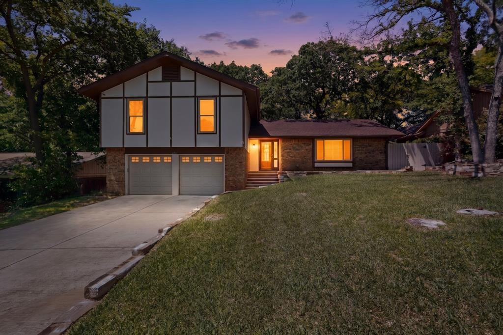 Woodland West opportunity backing to a peaceful green space. This home offers a spacious and functional layout with two living areas and two dining spaces, providing flexibility for everyday living and entertaining. The kitchen features granite countertops, a double oven, pantry, and connects to both the formal dining area and breakfast nook with views of the backyard. The family room is full of character with wood beamed ceilings and a brick fireplace, along with convenient access to a half bath. The primary suite includes dual sinks, granite countertops, and an oversized walk in tiled shower. Three additional bedrooms offer built in storage and ample space. Step outside to a covered patio surrounded by mature trees, creating a private outdoor retreat. The backyard also includes a treehouse, adding charm and functionality to the space. With a little TLC, this property presents a great opportunity to add value and make it your own. Conveniently located near major highways, shopping, and local amenities.
