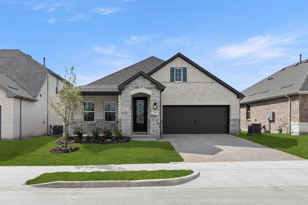 MLS# 21254464 - Built by Ashton Woods Homes - Jun 2026 completion! ~ Backs to Trees!New home by Ashton Woods in Anna, TX. Designed with the Foundry Collection, this home showcases vintage-modern finishes. The open foyer leads to an elongated entry hallway where two secondary bedrooms share a full bathroom and a convenient linen closet. At the heart of the home, the chef-inspired kitchen offers an eat-in island and a spacious walk-in storage pantry and opens seamlessly to the dining area and family room with views of the covered patio for effortless indoor-outdoor living. The private primary suite boasts a dual-sink vanity, a walk-in shower with glass enclosure, a linen closet, and a generous walk-in closet. A sprinkler system, landscaping package, energy-efficient features, and much more are all included in this new home by Ashton Woods.