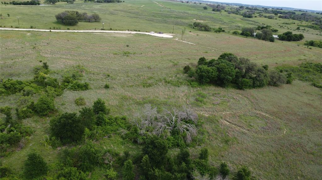 This 5.614 acre lot of vacant land offers great opportunities for agriculture use with open pasture and mature trees. With its manageable size, the property is ideal for hobby farming, horses or a homestead. The terrain allows for grazing, gardening or future improvements such as barns, fences or a residence. Whether you are looking to invest in land, start a small agriculture venture, or enjoy a private retreat, this property presents a valuable opportunity with long term potential. There are multiple build sites, along with a seasonal creek that runs through the property. 
7.7 mile drive to Proctor Lake, 7 minute drive to Dublin and 20 miles too Stephenville.