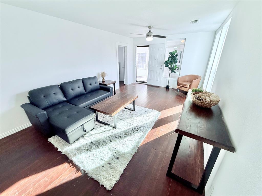 Move-in ready and full of charm, this 3-bedroom, 1-bath home offers original hardwood floors paired with tasteful updates to the kitchen and bathroom—so you get character without sacrificing convenience. The flexible back room is perfect for a home office, playroom, or bonus space to fit your lifestyle. Enjoy year-round comfort with an enclosed front porch and unwind on the covered back porch overlooking a spacious backyard—ideal for entertaining, pets, or gardening. A carport adds everyday convenience, making this home as practical as it is inviting. Perfect for first-time home buyers or investors. Contact Christin at 903-818-2076.