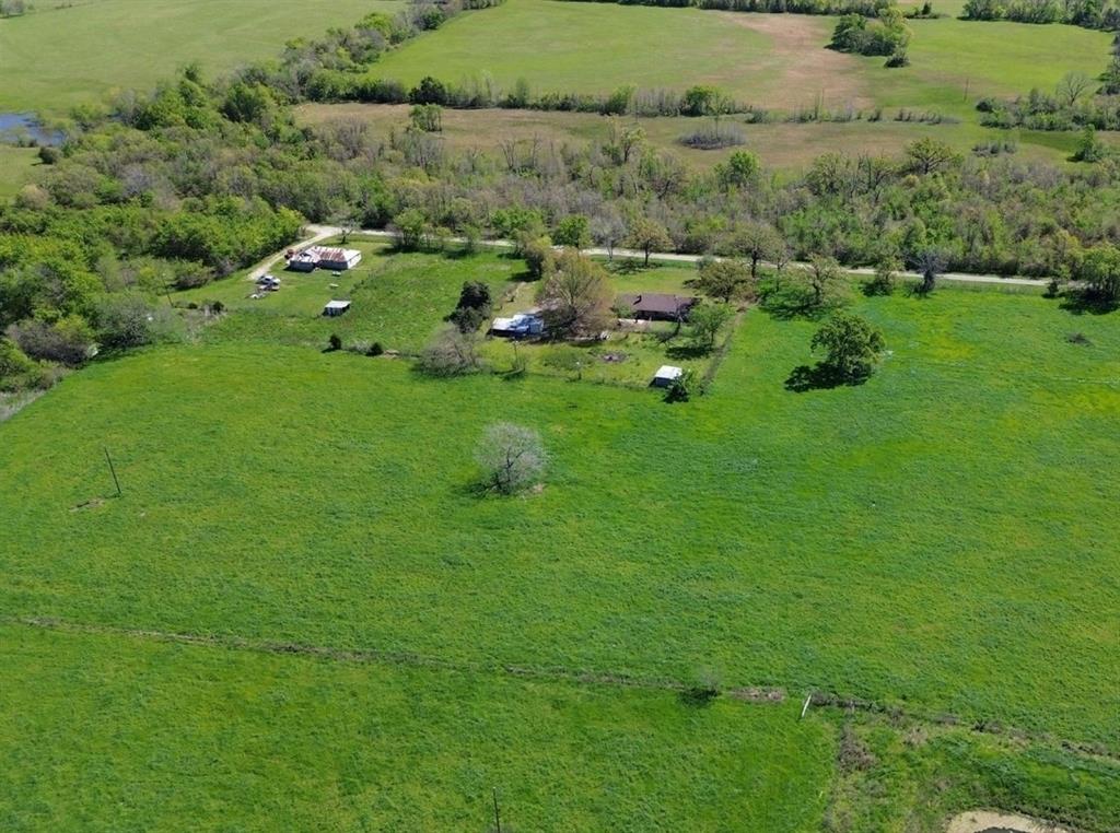 Beautiful 5.5 acres in the country and near Lake Fork. Great place to build your barndominium or site built home. No mobile homes. Restricted to 1000 sq ft and up. Water and electric available, owner has will serve letters from utiility companies. Will consider owner financing. All information is approximate, buyer and buyers agent to verify all information.