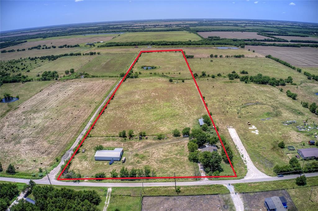 Great opportunity for building your own home and equestrian property, development, recreational land or light industrial to operate a business.  Perfect location and beautiful views with easy access to Hwy 380.   Horse barn with 8 stalls, 4 Dutch Doors with runs, tack room, and additional room with electricity and water.  Room for whatever you want and outside of the city limits.
