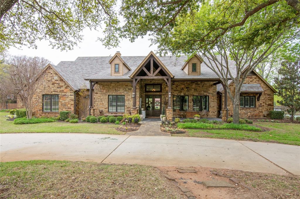 Gorgeous 2.7+ AC lot has magnificent home, outdoor living + guest house! Enter to beamed 2 story ceilings - full wall windows in living, family & primary suite overlook expansive pool, outdoor living and private lot.  Chef's kitchen w-Jenn Air gas range, pot filler, built in fridge, oversize island for prep and walk-in pantry with cabinets-counters-microwave, all open to living & dining. Primary suite has walkout access to covered patio, fireplace, bath w-double shower, jetted tub, and dbl vanities. Huge walk in closet w-built in storage. 2ndary bedrooms share Jack-Jill bath w-3rd bdm next to hall bath. Family room has built-in kitchenette-fridge, MW & sink in wall of cabinets - walk out door to patio. Oversize utility w-work island & desk. Upstairs find game room & bedroom. Covered patio includes outdoor kitchen-gas grill, fridge, sink, and serving bar. Saltwater pool w-spa has heater.  Cottage has bath, laundry & kitchenette. House was taken to studs & rebuilt in 2011. GCISD OR KISD!