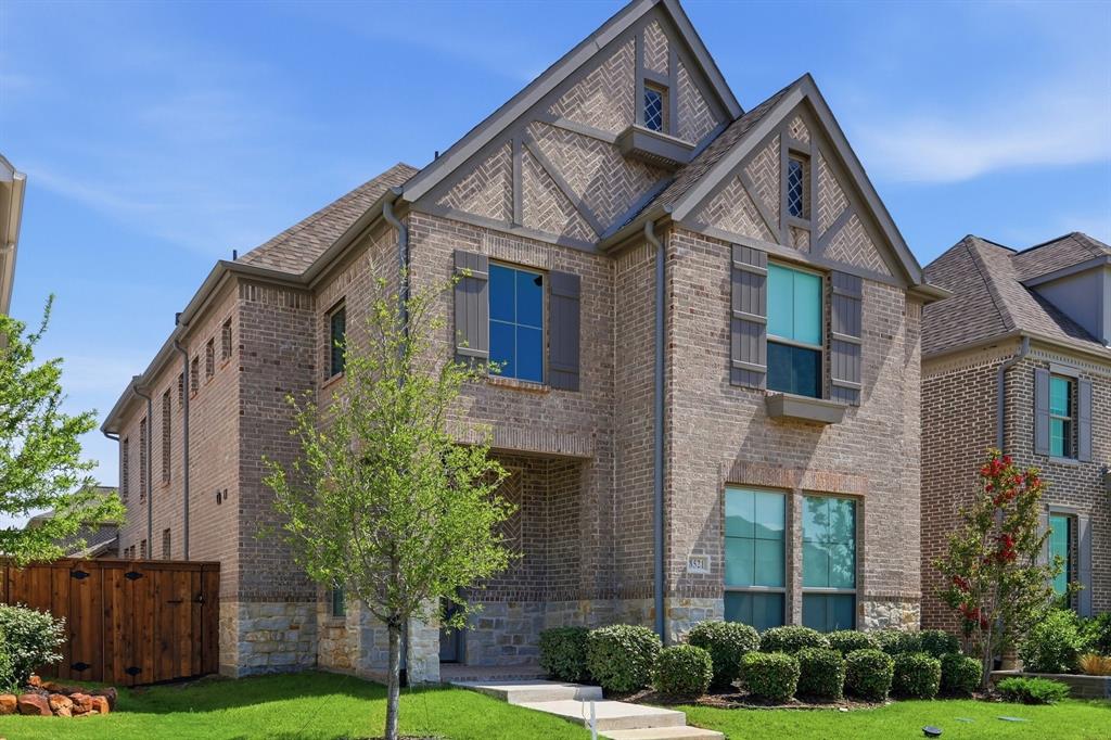 COME HOME TO THIS - RESORT STYLE LIVING IN THE COLONY! LAKE LEWISVILLE WATER VIEWS! Amazing subdivision with GOLF COURSE, LAKE ACCESS WITH LAKE FRONT WALKING TRAILS ACROSS THE STREET - a MARINA is coming soon! INFINITY POOL overlooks the Lake! PICKLEBALL COURT and SPLASH PAD - just to name a few of the fabulous amenities in this high-end subdivision! Some of the home features include, gorgeous luxury hardwood floors, fireplace, electric shades, ss appliances, 5 burner cooktop, walk-in pantry, top of the line finishes, gorgeous backsplash in the kitchen, and farm sink. Notice the light that infiltrates this home! Primary suite is extra-large and boast a large spa-like bathroom with double vanities, over-sized shower and separate closets. The family room has 19' ceilings! Outside enjoy a roof covered patio with a nice privacy fence. Lots of entertainment options close by including, park, movies, restaurants, retail shops. Groceries are 2 minutes away! PGA Frisco Headquarters close by! This property is approximately 20 minutes for the new UNIVERSAL KIDS' STUDIO! See drone, 3D Video and Floor plan attached to MLS!