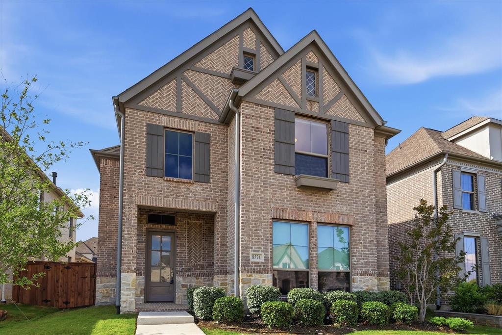 COME HOME TO THIS - RESORT STYLE LIVING IN THE COLONY! LAKE LEWISVILLE WATER VIEWS! Amazing subdivision with GOLF COURSE, LAKE ACCESS WITH LAKE FRONT WALKING TRAILS ACROSS THE STREET - a MARINA is coming soon! INFINITY POOL overlooks the Lake! PICKLEBALL COURT and SPLASH PAD - just to name a few of the fabulous amenities in this high-end subdivision! Some of the home features include, gorgeous luxury hardwood floors, fireplace, electric shades, ss appliances, 5 burner cooktop, walk-in pantry, top of the line finishes, gorgeous backsplash in the kitchen, and farm sink. Notice the light that infiltrates this home! Primary suite is extra-large and boast a large spa-like bathroom with double vanities, over-sized shower and separate closets. The family room has 19' ceilings! Outside enjoy a roof covered patio with a nice privacy fence. Lots of entertainment options close by including, park, movies, restaurants, retail shops. Groceries are 2 minutes away! PGA Frisco Headquarters close by! This property is approximately 20 minutes for the new UNIVERSAL KIDS' STUDIO! See drone, 3D Video and Floor plan attached to MLS!