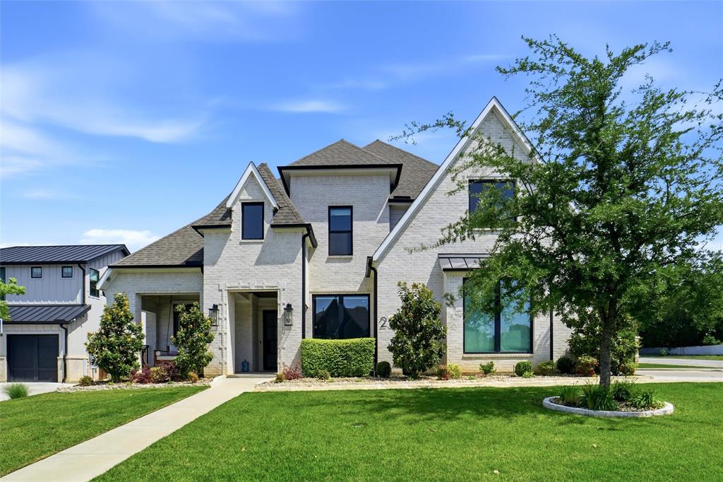 A rare modern retreat in North Keller, this 2020-built home offers resort-style living for under $2M just minutes from Westlake and Southlake. Filled with natural light, soaring ceilings, and designed for effortless indoor-outdoor living, the home blends clean architectural lines with refined, inviting spaces created for both entertaining and everyday luxury. Expansive glass and open sightlines create a seamless connection to the resort-style outdoor setting beyond. The backyard was designed to feel like a private resort, featuring a custom pool with tanning ledge and oversized spa, a covered outdoor living area with built-in kitchen and BBQ, a wood-burning fireplace, and low-maintenance turf creating a lush setting for year-round enjoyment. Inside, the flexible floor plan includes five bedrooms, with a serene primary suite and private guest retreat on the main level ideal for multigenerational living or extended stays. Upstairs, additional bedrooms, a spacious game room, and a dedicated media room provide room to relax and unwind. Additional highlights include a wine cellar, electric window shades, built-in refrigerator, a 3-car garage, gated RV parking with extended side space, and no HOA. Built by Lingenfelter Custom Homes.