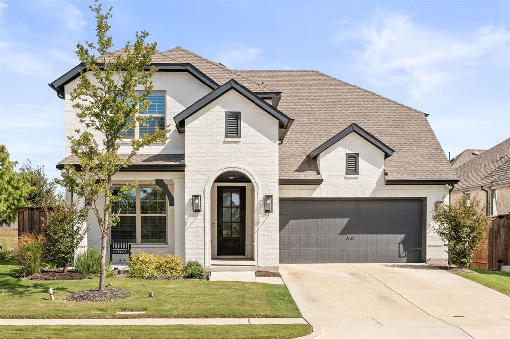 ASSUMABLE 3.49% ARP FHA FINANCING AVAILABLE!!! Elegantly upgraded home in Sandbrock Ranch!  Features include: Painted brick exterior, large covered front porch, decorative lighting, plantation shutters, white oak hardwood flooring on the staircase and upstairs hallway, complemented by elegant wainscoting along the stairwell. The primary suite and upstairs closets include custom California Closet systems for organized luxury. The mudroom boasts a shiplap accent wall, while the laundry room includes custom cabinetry for extra storage. Extended kitchen cabinets all the way up to the ceiling for additional storage.  The office has been enhanced with built-in shelving and cabinets topped with granite, along with new engineered wood flooring shared by the master bedroom. The garage includes a sleek epoxy floor coating, adding both style and function. Every detail reflects thoughtful craftsmanship and quality upgrades throughout.