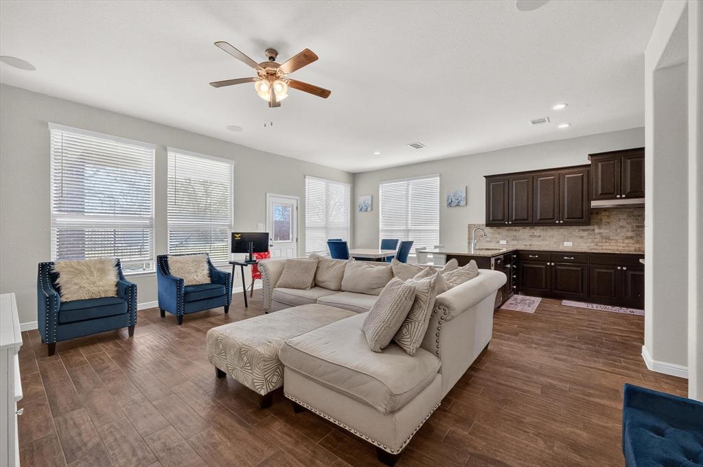 Some houses in Mansfield ISD look good on paper. This one on Kettle Creek makes sense the moment you walk in.
Built in 2020 and tucked inside a gated community zoned to Mansfield Legacy High School, this 4 bed, 2.5 bath home delivers 2,544 square feet that actually lives well and not just photographs well. The main level is open without feeling like an echo chamber: the kitchen, dining, and living areas connect naturally, anchored by large windows that pull in light all day and a layout that works whether it's a Tuesday night dinner or a Saturday with a house full of people. The primary suite is genuinely private. Dual sinks, a garden tub, and a separate shower with a built in bench that makes the room feel more spa than suburban. Upstairs, a spacious game room gives you a blank canvas: media room, playroom, second living space, dedicated homework zone, this space will grow with your family. The secondary bedrooms are sized for real use, not just furniture.
The HomePro smart home system adds a layer of remote control and peace of mind that newer buyers expect and this one comes ready. Step outside and the community does something most neighborhoods don't: a pond, a pavilion, and fireplace that make the front door feel like a destination, not just a return.
Minutes to US-287 and SH-360, with easy access to both Fort Worth and Arlington. Priced at $440,000, this is a 2020 build with gated security, smart tech, and one of Tarrant County's most sought after school districts. Everything is already done. You just move in.