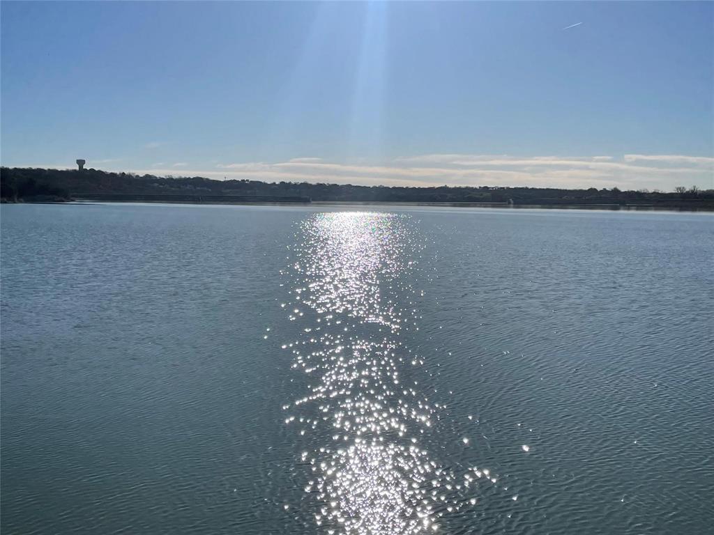 Location, Location, Location! Wonderful Opportunity to build your Dream Home on this almost 1 acre Deeded Residential Lot on Main Body Lake Worth. Situated well away from the 820 & 199 Bridges the location is serene and peaceful. Spectacular Sunrises and Sunsets. Located just inside the 820 loop it offers easy access to JRB Carswell, DFW Airport, Downtown Fort Worth, Lockheed Martin as well as other Major Employers, Restaurants, Stores and Conveniences. Just bring your Architect, Builder & Imagination! Buyer will need to get a Survey and connect to City Sewer. Seller offering Concessions.