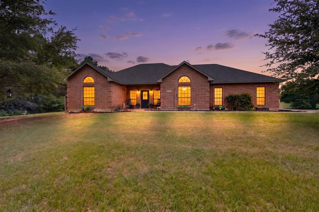 Nestled in the peaceful countryside of Combine, TX, 1362 Eubanks Rd offers the perfect blend of rural serenity and modern living. This expansive property sits on a sprawling lot, providing plenty of space to stretch out and enjoy the great outdoors. With its mature trees and wide-open views, the setting is nothing short of idyllic.
The home itself boasts a warm and inviting layout, featuring 3 bedrooms and 2 bathrooms with a study designed for both comfort and functionality. The  spacious kitchen with granite countertops or cozy living room with a brick fireplace is perfect for daily living or entertaining is sure to impress.