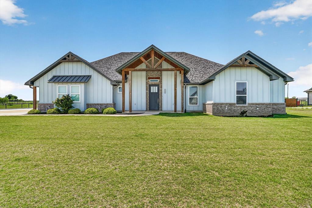 Welcome to your private slice of Texas living in the highly sought after Heritage Acres community, located in the award winning Brock ISD! Situated on just over an acre, this beautifully maintained single-story home offers 4 spacious bedrooms, 3 full bathrooms plus a fully equipped shop that has its own private bedroom and bathroom. Built in 2020, this thoughtfully designed home features 4 Bedrooms, 3 full bathrooms, and an open concept floor plan that's ideal for both everyday living and entertaining.The home features a warm and inviting living area with a cozy wood-burning fireplace, seamlessly flowing into a well-appointed kitchen complete with granite countertops, a large island, breakfast bar, gas cooktop, and abundant cabinetry. Just off the kitchen, a versatile flex room provides the perfect space for a home office, playroom, or additional living area. The private primary suite offers a relaxing retreat with a spa-like ensuite bath featuring dual vanities, a garden tub, separate shower, and a generous walk-in closet. Additional bedrooms offer flexibility, including options for guest suites or multi-generational living with ensuite baths. Step outside and discover what truly sets this property apart. In addition to the spacious backyard and covered patio, you'll find an impressive fully equipped workshop with electricity that includes its own finished bedroom and bathroom with heating and cooling. This incredible shop offers endless possibilities and exceptional value rarely found in today's market.A rare opportunity to own a move in ready home with a fully functional shop featuring its own living quarters in one of the area's most desirable school districts Brock ISD!