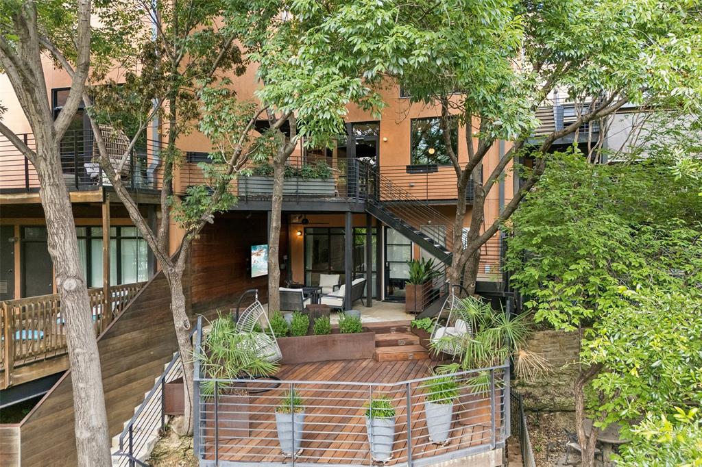 Experience elevated urban living in this beautifully updated townhome, nestled within an intimate gated enclave of just 19 residences in the heart of Victory Park. Combining lock-and-leave convenience with exceptional craftsmanship, this home offers a rare opportunity to enjoy luxury living in one of Dallas’ most dynamic neighborhoods. At the center of the home is a fully renovated chef’s kitchen featuring professional-grade Thermador appliances, striking marble countertops, and thoughtfully curated custom finishes designed for effortless entertaining. The light-filled, open-concept floor plan seamlessly extends to a private walkout deck, an inviting outdoor retreat ideal for relaxing or hosting guests.

The residence offers two spacious bedrooms, two elegantly appointed baths, and refined architectural details throughout. A versatile third-floor office has been transformed into a custom closet and dressing room and may easily function as a third bedroom, offering flexibility to suit your lifestyle. Beyond the home itself, residents enjoy an unmatched lifestyle with private access to the iconic Katy Trail and The Loop Plaza, perfect for walking, running, or cycling. Ideally positioned within walking distance of the American Airlines Center, the new Goldman Sachs Dallas campus, Scotiabank’s regional headquarters, premier shopping, and Dallas’ celebrated dining scene, the location is second to none.

The HOA, at $4,680 annually, provides exceptional value and ease, covering grounds maintenance, newest top of the line AT&T high-speed fiber internet, and access to community amenities, including a resort-style pool. Offering luxury, convenience, and a true lock-and-leave lifestyle, this is Victory Park living at its finest.