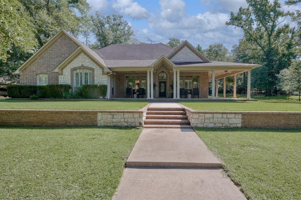 Discover the perfect blend of country living, functionality, and space on approximately 8.466 beautiful acres in Lindale. This versatile property offers room to live, work, and enjoy the East Texas lifestyle with a well-designed 4-bedroom, 2 & 2.5-bath home surrounded by open space and endless possibilities. Inside, you'll find a comfortable layout with generous living areas, abundant natural light, and plenty of room for everyday living or entertaining. The spacious kitchen and dining areas create a welcoming gathering place, while the private primary suite offers a relaxing retreat. Additional bedrooms provide flexibility for guests, hobbies, or a home office. Classic woodwork and custom details throughout the home. 
The heated pool with a beach entrance and hot tub are perfect for relaxation or games with the family.
Step outside and experience what truly sets this property apart. A massive 50’ x 60’ shop is ready for business, storage, equipment, projects, or recreational use and includes three roll-up doors for easy access. Attached apartment space adds incredible value and flexibility for guests, extended family, rental potential, or office use. The impressive 44’ x 30’ carport provides ample covered parking for vehicles, RVs, boats, or trailers.
The acreage offers a scenic setting with room for animals, gardening, outdoor recreation, or future improvements. Whether you're dreaming of a homestead, hobby farm, home-based business setup, or simply wanting more privacy and room to roam, this property delivers. Conveniently located with easy access to Lindale amenities while still offering the peace and freedom of country life. Rare opportunities like this don’t come along often—come explore all this exceptional property has to offer.