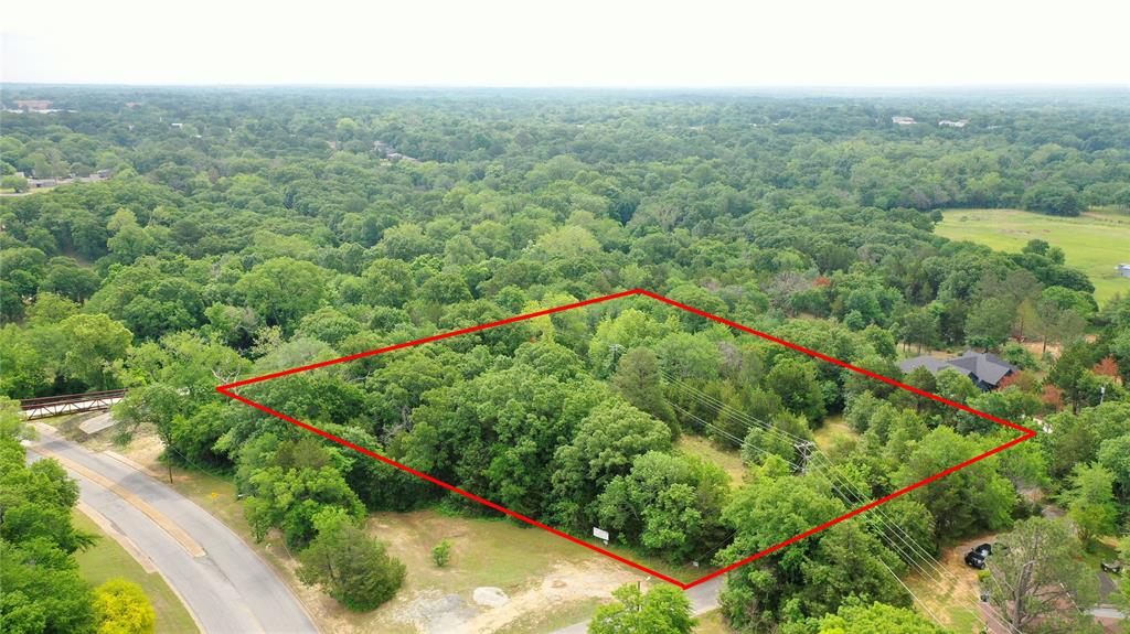 If you are looking for the ultimate larger lot to build your dream home in the Denison area, you should take a look at this.  Property is wooded, and backs up to the new Katy Trail for bikes, walking, etc.  NO divisions of current plat and single family residence only, you would never know you were in the heart of Dension TX. this acreage sits higher off of street with as many trees as you want to keep, to protect your privacy.  Only two lots left, side by side for this small area surrounded by fabulous homes.   Easy access to medical, retail, dining, hiways and schools.  This is truly a must see if you are considering a custom home location.  
buyer to verify all