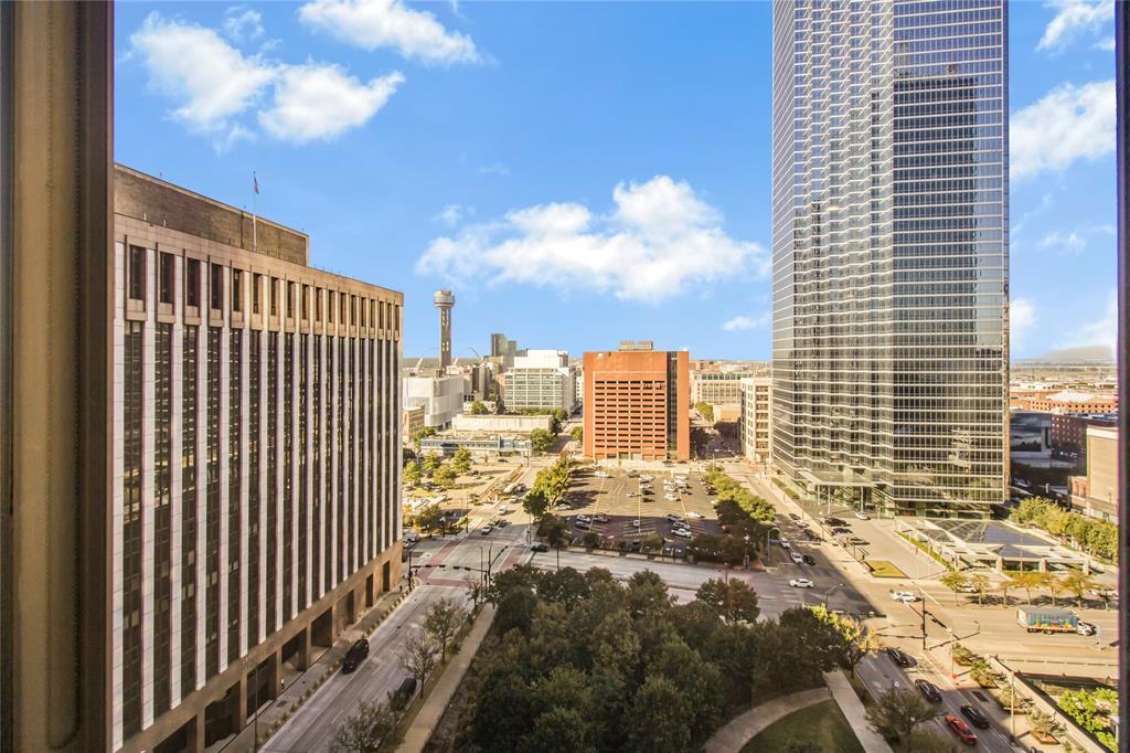 Why settle for today's higher rates when you can step into a 3.5% mortgage? Qualified buyers may assume the seller's existing loan and potentially save hundreds per month! Experience Breathtaking Sunsets in the Heart of Downtown Dallas. A picturesque moment in time awaits you from this stunning 14th-floor condo, ideally situated in the vibrant heart of downtown Dallas. This west-facing unit offers an unbeatable view of Reunion Tower and a bright, open layout designed for modern living.

The spacious living and dining area is perfect for entertaining, featuring engineered hardwood floors throughout, sleek quartz countertops, and new recessed LED lighting. The kitchen is equipped with premium stainless steel appliances, and solar shades provide comfort while maintaining the incredible views. The AC unit was replaced in 2019.

This home also includes two reserved parking spaces in the secure, gated garage.

Residents of The Metropolitan enjoy resort-style amenities, including:

24-7 concierge service and on-site security
Sparkling resort-style pool and hot tub
Outdoor grilling stations and private green space
Fully equipped fitness center
Movie and media rooms
Conference rooms for work or gatherings
A workshop with tools for builders

Live the downtown lifestyle you’ve always wanted—where comfort, convenience, and style meet. Step outside and immerse yourself in all that Downtown Dallas has to offer. Just across the street, Civic Garden provides a peaceful urban oasis. Stroll to the AT&T Discovery District, where high-tech art installations, food trucks, and live music create an energetic gathering place. Dine at award-winning restaurants, explore Klyde Warren Park, or catch a show at the Majestic Theatre. The Arts District, Dallas Farmers Market, Neiman Marcus flagship store, and countless nightlife venues are all within blocks.