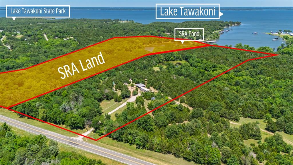 A truly unique property with endless possibilities whether you are looking to build your dream home or looking for the perfect weekend getaway to enjoy the peace and quiet of the country! Located just one hour East of the Metroplex with quick Hwy access for an easy commute! Also situated just one mile South of the Lake Tawakoni State Park which features a 4-lane public boat ramp, 376 acres of oak forest, five miles of lakeshore, hiking trails, swimming, fishing, and so much more! The lake itself spans over 37,000 acres and is known for its recreation as well as its stock of catfish, crappie, and bass! The property boasts 20 Acres with beautiful mature trees, gated entrance, gravel drive, and a large pond approximately 1 acre in size! Water, electric, aerobic septic, and internet in place! There is a mobile home on-site that will convey! The home is used as community bathrooms, office, lobby, and make ready areas for the business currently being operated on-site. There is a floorplan sketch available in the transaction folder. There are a total of 3.1 baths with exterior access. Inside you will find 2 bedrooms, 1 full bath, laundry, living, kitchen, and breakfast area. Property sits adjacent to a large area of SRA leaseback of which the current owner leases a large portion including waterfront access to the lake cove on the West side of CR 3829 fed by Caney Creek as shown in the aerial photos! There is no direct access to open water via a boat, but you can take a kayak through the culvert! There is tons of wildlife in the area and excellent fishing in both the large cove as well as the pond on the deeded acreage! Enjoy hunting, fishing, and hiking trails of your very own while also having access to all that the State Park offers just minutes away! Bring your fishing pole, your binoculars, and your hiking shoes! Imagine yourself with a place like this to call home! Must have an appointment and agent present to view the property due to current business on-site!
