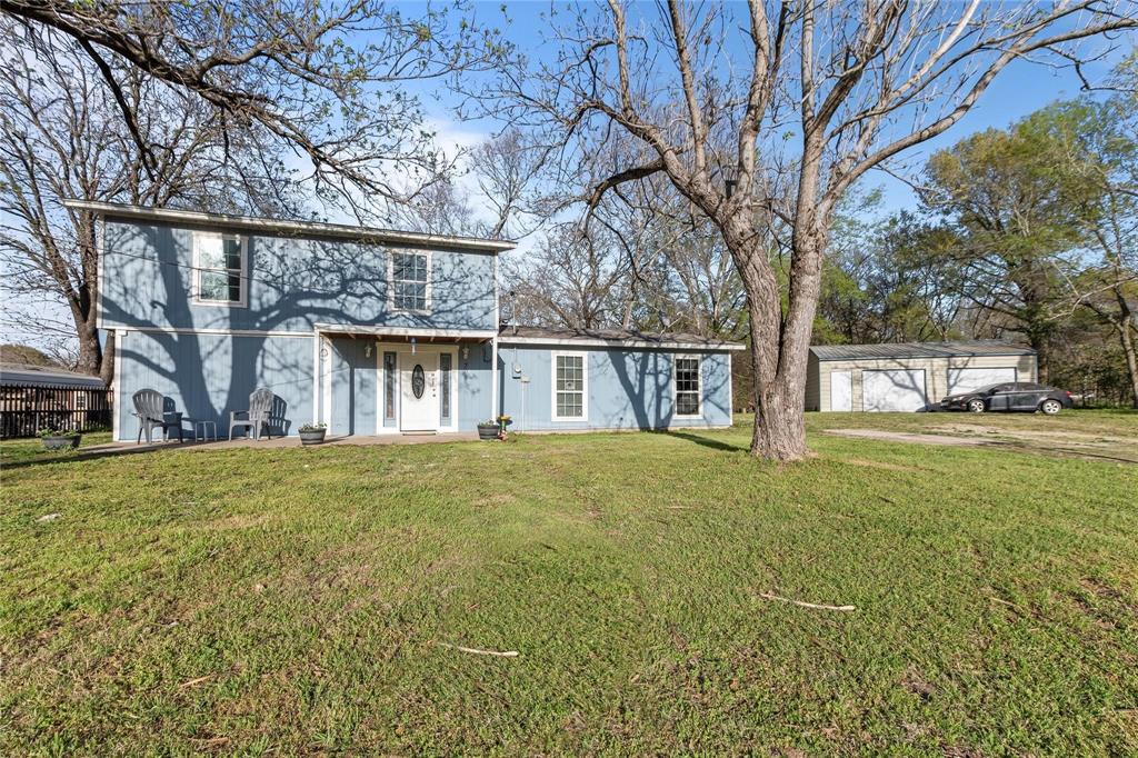 Nestled in a sought-after waterfront neighborhood, this cozy 4-bedroom, 2-bathroom home sits on two oversized lots, offering a massive backyard found near Cedar Creek Lake. While the home needs some TLC, it is packed with high-value features, including a large kitchen island perfect for entertaining and a primary suite featuring a modern walk-in shower. Outside, you’ll find a 2-car bay detached garage and an additional storage building, providing plenty of room for vehicles, tools, and lake toys. Best of all, you’re just moments away from the water with convenient access to the community boat ramp. Whether you’re looking for a primary residence or a weekend getaway to flip and customize, this property offers incredible bones and even better location.