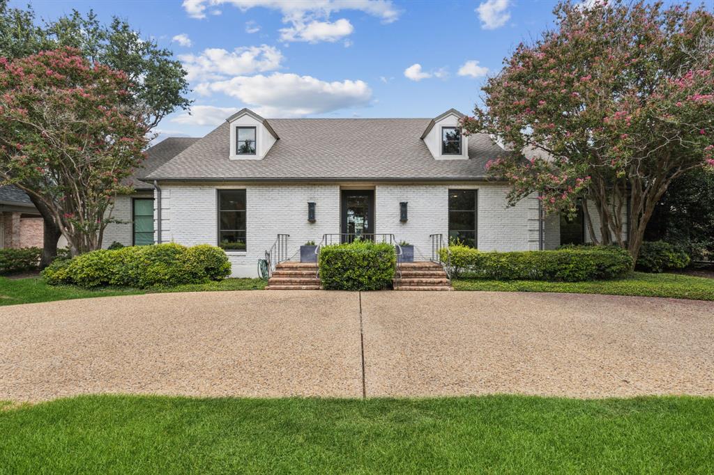 All repairs have been made: New hardwood floors, foundation work, drainage addressed, and encapsulated crawl space; beautiful ONE-STORY home on an elevated lot directly across from Dallas County Club facing the fairway. It also includes views of the Dallas skyline! Large lot on 90X180 in prime location blocks from HP Village, Armstrong Elem, McCulloch Intermediate & Highland Park Middle schools.  Rare find with charm + today's modern amenities that have been completely updated, two living areas with fireplaces, formal dining with tasteful wall coverings, beautiful hardwood floors, and 10-foot ceilings. A cook's kitchen includes a large island with natural stone counters, custom cabinets, Viking gas range, walk-in pantry, and a thoughtfully placed office tucked away. Well-appointed primary suite with with split bath areas and closets. Experience the convenience and security of a rear-entry two-car garage, accessible via the alley, offering privacy and never having to get on Mockingbird.  The covered patio overlooks the backyard with ample room for a pool and play area. This Park Cities gem is the home you've been waiting for!