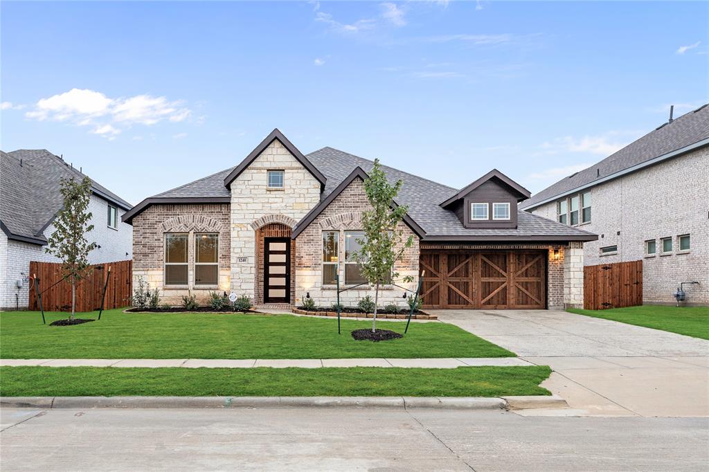 BRAND NEW! NEVER LIVED IN! Bloomfield’s Caraway plan is the definition of single-story sophistication, blending thoughtful design with rich details that make everyday living feel extraordinary. From the moment you pull up, the brick-and-stone gabled front elevation with cedar garage doors sets a stately tone, while the 8' front entry door makes an unforgettable first impression. Inside, the home opens into a bright, free-flowing layout anchored by a Family Room with a fireplace and vaulted ceilings that emphasize both space and light. The Deluxe Kitchen is designed for serious cooks and casual hosts alike, offering upgraded quartz countertops, a 5-burner gas cooktop, and deluxe double ovens alongside abundant cabinet storage and a huge walk-in pantry. With Wood-look Tile flooring running throughout all presentation areas, durability and style come standard. This layout delivers 4 bedrooms and 3 full baths, including 2 bedrooms with private ensuites—a rare find in single-story living. The Primary Suite is a private retreat with a spa-inspired bath featuring separate vanities, an oversized shower with upgraded tile accents, and a large walk-in closet with convenient access to the laundry. Outdoor living shines with a covered patio, perfect for extending gatherings beyond the walls of the home. Set on an oversized interior lot within a vibrant community that includes a swimming pool, the Caraway is equal parts practical and impressive. Visit Bloomfield at The Oaks today to see how this plan balances luxury and livability in a way that never goes out of style.