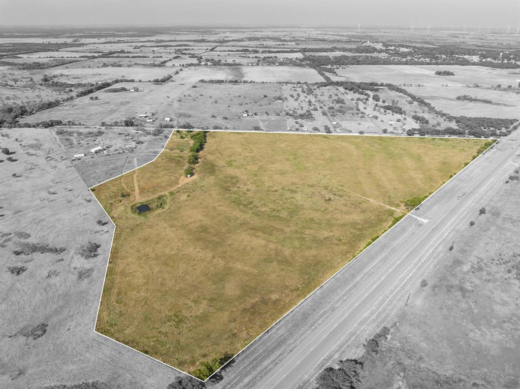 Discover the exceptional opportunity to own 36.08 acres of unimproved rural acreage, perfectly positioned along State Hwy 171, between Coolidge and Tehuacana. The property boasts a prime location, conveniently situated right off Highway 171, ensuring easy access to neighboring towns and essential amenities. The ample acreage presents an excellent opportunity for farming, ranching, or any agricultural pursuit of your choice. A valuable asset to the property is the presence of a tranquil wet weather pond. Not only does it enhance the aesthetics of the land, but it also offers potential irrigation options for agricultural purposes. Whether you plan to develop the property for agricultural purposes or as an investment for the future, the strategic location and size make this a compelling investment opportunity. Electric available. No ground water or public water access. Buyer to verify any and all restrictions, measurements, zoning, taxing and utility information.