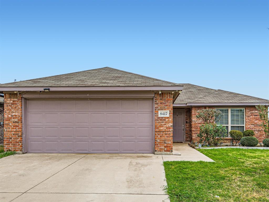Charming 3-bedroom, 2-bathroom home nestled in Tarrant County's Everman community. This home exudes warmth and openness with its seamless flow from the expansive Living Room to the Kitchen and all of the living spaces. The kitchen boasts black appliances and a delightful breakfast nook creating the perfect setting for morning gatherings. On the opposite side of the home you'll find all of the bedrooms where the master bedroom has an ensuite that features a soothing soaker tub, double sinks and a walk in closet. Cleverly designed with convenience in mind, the secondary bedrooms are  nearby. Step outside to discover a perfectly sized covered patio and fenced backyard offering privacy and ample room for play and entertainment.
This community is ideally situated near schools, convenient local shopping, I-35 and I-20, making it the perfect place to call your home. Don't miss the opportunity to make this delightful property yours! Click the Virtual Tour link to view the 3D walkthrough.