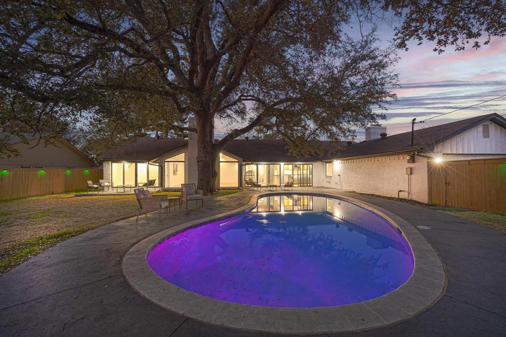 LOCATION, LOCATION, LOCATION — PRIVATE SCHOOL CORRIDOR!

Stunning mid-century home, completely remodeled into a modern masterpiece. From the moment you step inside, you’re welcomed by expansive glass doors and a light-filled foyer that opens into an elegant living space. The show-stopping floor-to-ceiling tiled fireplace anchors the room, while large windows flood the home with natural light and offer beautiful views of the backyard pool.

Designed with both style and functionality in mind, the kitchen overlooks the backyard—keeping you connected to every gathering on the patio. This home was truly made for entertaining.

The primary suite is thoughtfully positioned on the opposite side of the home, offering added privacy. It features a spacious walk-in closet ready to be customized to your needs.

Enjoy generously sized secondary bedrooms, a cozy family room with its own fireplace, and a separate living area with expansive windows that enhance the home’s bright, open feel. Step outside to a large backyard complete with a swimming pool—perfect for relaxing or hosting.

The home currently has a lease in place through April 2027. Showings will be approved with executed offer and proof of funds. At closing, the buyer will receive a credit for the full remaining rent due under the lease term, as well as the deposit, so there will be no responsibility for collecting future rent payments.