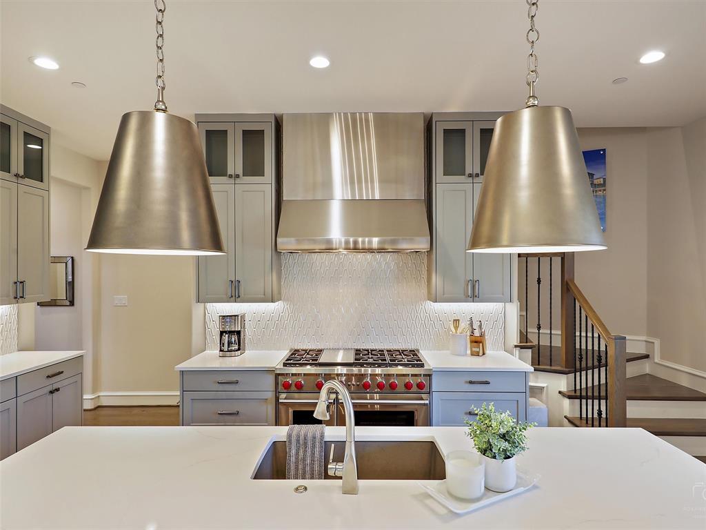 Welcome home to this turn-key, lock&leave style European retreat in coveted Westlake Entrada—a walkable community modeled after a Catalonian village. Escape from everyday busyness as you walk along cobblestone streets or relax on the covered veranda overlooking a peaceful canal. Welcome your guests through the private stone Courtyard with fireplace into open concept Dining-Living filled with luxurious finishes including wood floors, marble fireplace + a wall of French doors with picturesque views. Entertain guests in the Chef's Kitchen with oversized marble island, prof appliances + designer lighting. The spa-like Primary suite is spacious & beautifully appointed with electric shades, marble counters, oversized soaking tub + stunning Canal views. Private Guest suite with en-suite down. Upstairs boasts a Game room with serve Bar + 2 bedrooms w en-suite baths. Step outside to enjoy a private Courtyard on 1 side & gorgeous views of the Water on the other side. Stroll to dining & shopping.