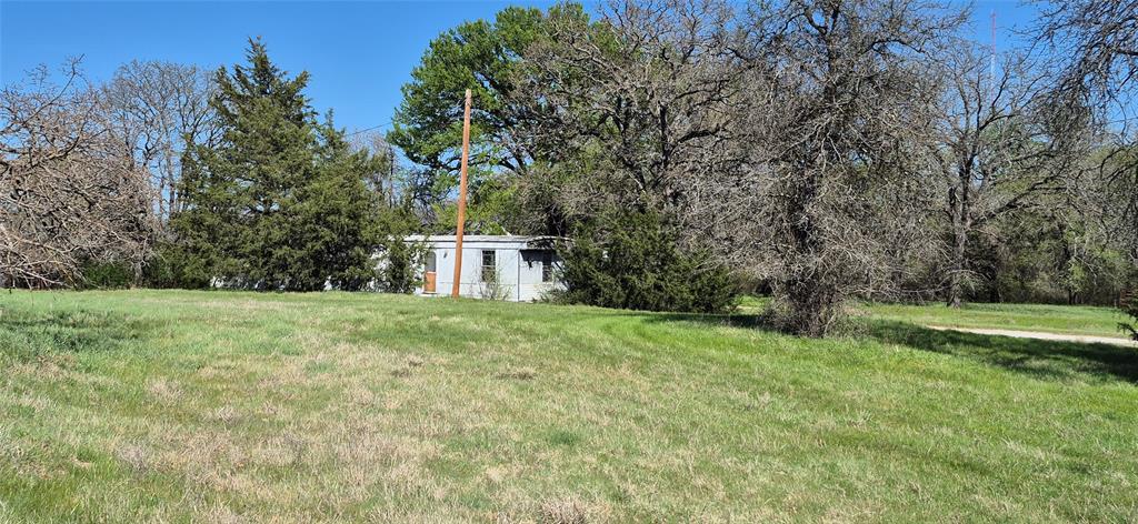 Nestled on nearly five acres in the scenic countryside of Boyd, this property offers a rare combination of privacy, and versatility. The land showcases a blend of open pasture and mature trees, creating possibilities for building, recreation, or agricultural use. A large metal shop adds exceptional value, providing ample space for equipment storage, hobbies, or workshop needs. Enjoy the tranquility of rural living while benefiting from convenient access to Highway 114 for an easy commute to the DFW metroplex. Whether you’re planning a custom home or a weekend getaway, this property provides the perfect canvas to bring your vision to life.