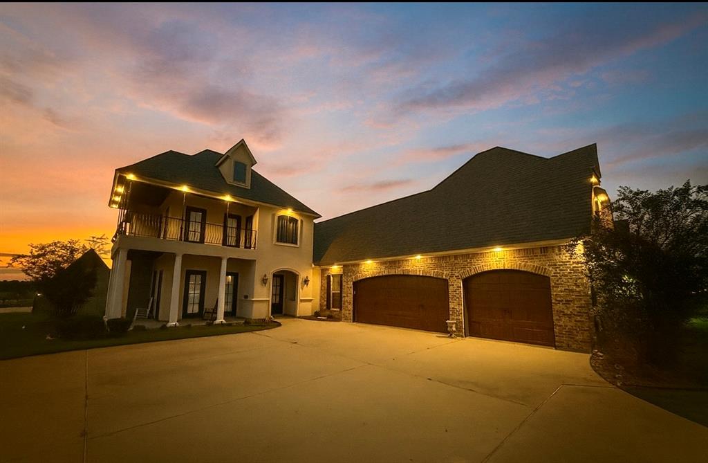 Beautiful 4-bedroom, 3-bath home on a corner lot in the lively Cathey Acres community of Stonewall! With 2,500 sq ft, this home offers tall ceilings, granite countertops, stainless appliances, gas range, and a spacious walk-in pantry. The private primary suite features dual sinks, a soaking tub, and a large walk-in shower. Outside, enjoy a 3-car garage plus an outdoor kitchen with fire pit—perfect for entertaining. Conveniently located near I-49 and local eateries, 103 Donna Lane is the perfect blend of comfort, style, and convenience.