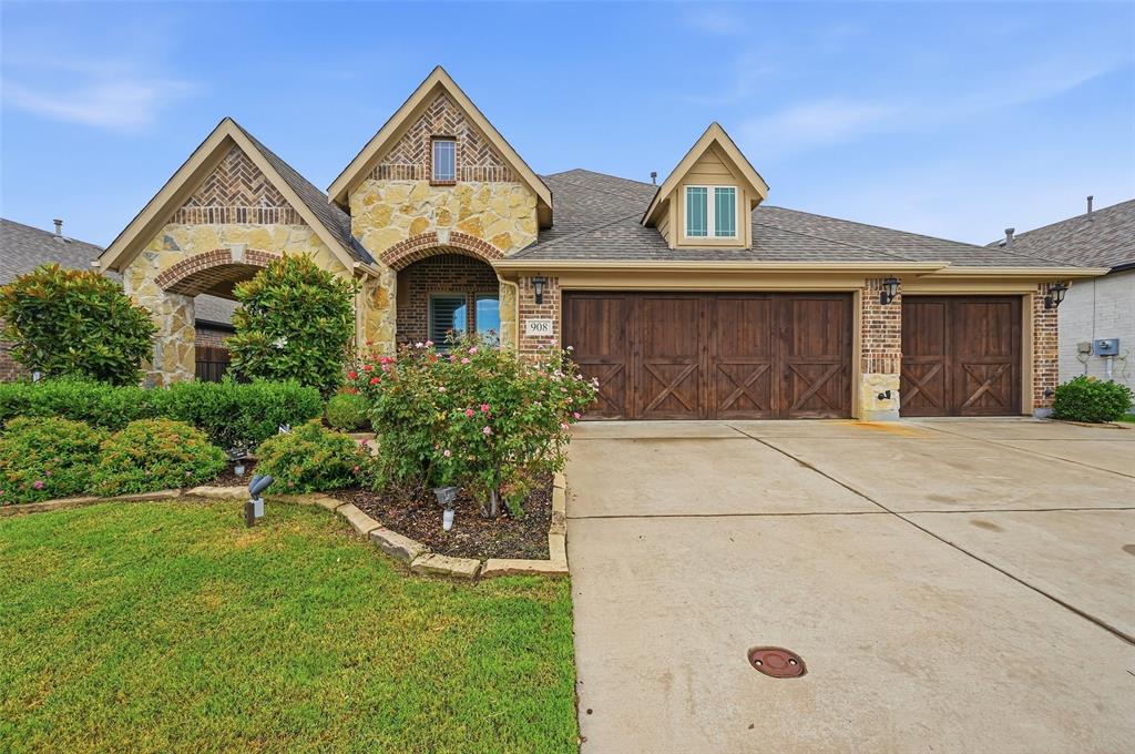 Former model home with all the upgrades! This popular Bloomfield 1.5-story home offers exceptional curb appeal with a beautiful brick and stone exterior, a 3-car garage, cedar garage doors, and professionally maintained landscaping. Inside, you’ll find 4 spacious bedrooms, 3 full baths, a private study with French doors, a game room, and a large primary suite with a sitting area. The open-concept floor plan features vaulted ceilings, abundant natural light, upgraded hardwood flooring, and designer touches throughout. The kitchen is perfect for entertaining with granite countertops, stainless steel appliances, gas cooking, and plenty of prep space. This move-in-ready home combines comfort, style, and functionality, making it a must-see for buyers looking for a home that truly stands out!