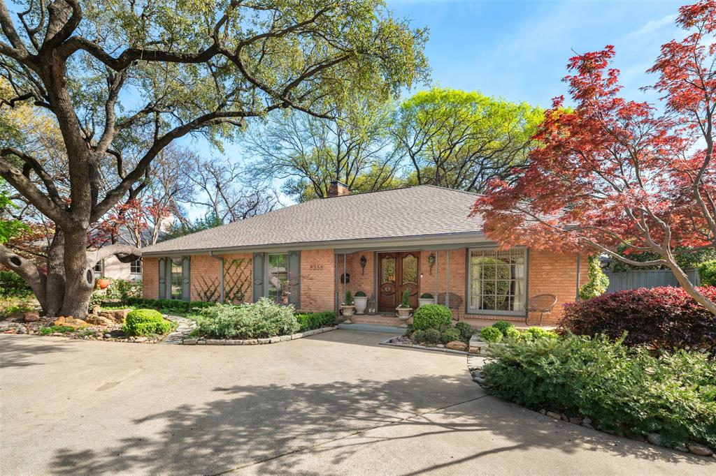 Beautifully renovated 3 bedroom, 2.5 bathroom, 2 car garage home on almost a quarter-acre lot. This elegantly renovated home is nestled beside West Highland Park in one of Dallas's most sought-after neighborhoods.  Conveniently located, and within walking distance to Highland Park Village, which has many fine dining restaurants, and luxury shopping.  Just a short stroll away through the timeless and expansive neighborhoods are some impeccable parks and access to all that Highland Park Village has to offer. This home was classically designed and renovated; kitchen updates include Wolf brand gas cooktop and oven, Carrara marble counters, lighted, custom kitchen cabinetry with soft-close drawers, Baldwin cabinet hardware, farm sink with Newport Brass fixtures. Breakfast area features Carrara marble waterfall along the built-in banquette. Formal dining room showcases an antique mirrored wall and designer wallpaper by Gracie.  Oak and herringbone patterned hardwood and marble flooring through-out the home accented with custom crown molding and paneling.  Two open-concept family rooms with skylight, fireplace with gas logs, and sconces, with a wall of windows that allow you to enjoy the lushly, landscaped, garden under a canopy of mature trees, with a large brick patio area for entertaining guests.  Home also features a large primary bedroom suite with French doors which open onto the outdoor living oasis.  Luxurious guest bedroom suite is a dreamy design in blue and white designer wallpaper by Gracie, and has a lighted, walk-in closet designed by California Closets, and a cedar lined closet in hallway for storage of your woolen wardrobe. The home has an oversized garage with electric gate to the driveway & has a front circular driveway for guests. Has a Trane HVAC system. The roof was replaced in November 2024, and the water heater was replaced in 2025. Located within a short drive to Highland Park Village, Inwood Village, access to the Tollway and Love Field Airport.