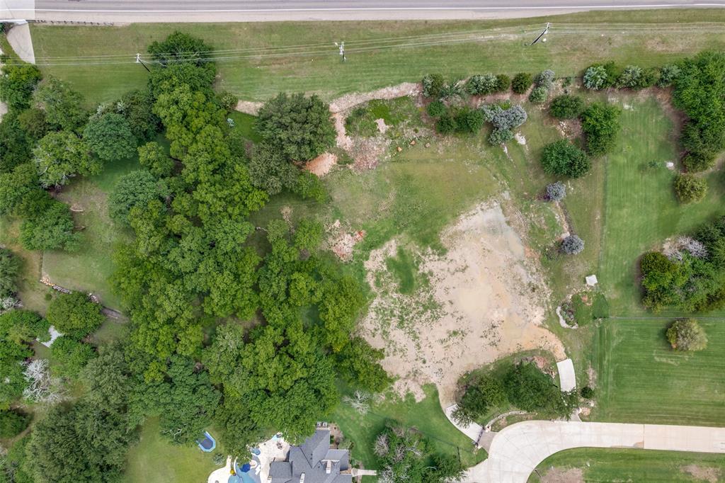Build your ultimate luxury dream estate on one of the final remaining vacant lots in the highly coveted Twelve Oaks community! This expansive, 4-acre premier homesite offers the rarest of opportunities: a completely build-ready, improved canvas that perfectly blends serene Hill Country privacy with modern, upscale conveniences. Nestled on the border of Prosper and Celina, this spectacular property lets you design a custom masterpiece without compromise.  Property Highlights Four Acres of Pure Privacy: Sprawling, flat, and highly usable acreage lined with a mix of mature Texas trees, offering an ideal setting for a grand custom mansion, a multi-car detached garage, or a private guest house.  Ready to Build Immediately: Bypass the massive headaches of raw land development. This premium lot is fully improved, featuring completed site clearing, paved asphalt road access, and underground city-style utilities already available at the property line.  Equestrian-Friendly Freedom: Embrace the true Texas estate lifestyle. The neighborhood’s rare zoning explicitly permits horses, giving you the freedom to build luxury stables right in your backyard. Elite Location & Community Amenities. Top-Rated Schools: Rest easy knowing your future estate is completely zoned for the acclaimed, award-winning Prosper Independent School District.  No City MUD-PID Taxes: Enjoy low, predictable annual costs overseen by an established, architecturally protective Twelve Oaks Homeowners Association, keeping your long-term property investment highly efficient. The Best of Both Worlds: Tucked away in a quiet, heavily treed enclave, you are still only minutes from the Dallas North Tollway, premier shopping along Preston Road, and luxury dining options. Do not miss out on one of the largest remaining blank canvases in the master-planned Collin County luxury corridor.  Bring your own custom builder and turn your architectural vision into reality!