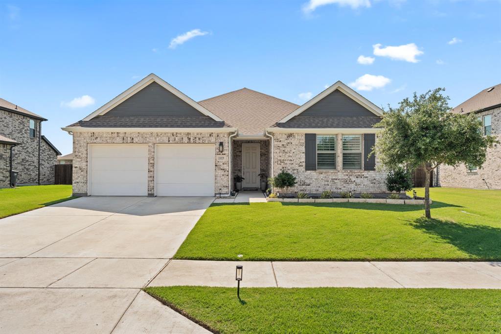 Beautifully maintained Ashton Woods home on an oversized lot offering extra privacy between neighbors and an extended driveway. This inviting open-concept floor plan was designed for both everyday living and entertaining, with warm natural light and spacious living areas throughout. The kitchen opens seamlessly to the dining and living spaces and features quartz countertops, stainless steel appliances, ample cabinet space, and a large island perfect for gathering with family and friends. The split-bedroom layout provides flexibility and comfort, while the covered back patio overlooks a fully fenced backyard with room to relax and unwind. Located in a peaceful community with nearby ponds for walking and fishing, plus a splash pad and playground just down the street. Convenient access to I-35W and Hwy 287 makes commuting to Fort Worth and surrounding areas easy. No fault of the sellers back on the market.