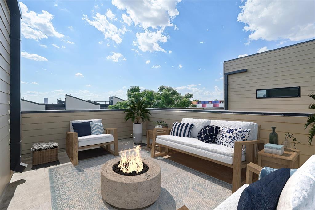 The best deal on the market — and it's not close. A 2021-built townhome minutes from Uptown, Downtown, and the Medical District. Higher-end finishes, massive kitchen island, hardwood floors throughout, and a rooftop deck with Downtown skyline views.

From the moment you walk in, you feel the space — and you know this one is different. The main living level is bright, open, and wider than any townhome you'll tour in the area. The finishes here are a cut above — this isn't typical builder-grade.

Open floor plan living area is large enough to fit an oversized sectional, real dining table, and has room to host a crowd — and it still doesn't feel full. Hardwood floors throughout, including the primary suite and entire first floor. The kitchen matches the scale: gas cooktop, farm sink, walk-in pantry, built-in wine fridge, and an island big enough to gather around.

Upstairs, the primary suite has wood floors, a real walk-in closet, and a bath with double vanity, soaking tub, and frameless marble shower. Second en suite bedroom on the same floor. Washer and dryer up here too — no hauling laundry between floors.

On the ground level, a full en suite bedroom with hardwood floors opens straight to a private fenced yard through a sliding glass door. Gym, office, guest suite — or all three at different times of the week. Two-car attached garage right next to it.

Two large outdoor spaces — a private fenced yard on the ground level and a rooftop deck up top. Open sky, Downtown skyline, golden hour every night you want it. The rooftop is your new favorite room.

Minutes from the best shopping and dining in Highland Park and Oak Lawn.