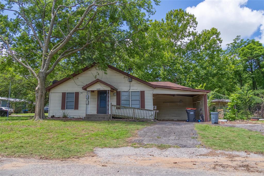 INVESTORS!! This 3 bedroom, 1.5 bathroom home offers solid fundamentals and clear upside, making it an attractive option for investors or buyers looking for a value-add opportunity. The open floor plan provides a great foundation, and the home is already functional as-is, but ready for cosmetic improvements—fresh paint and new bedroom flooring will immediately boost appeal and equity. Three oversized bedrooms and a large full bathroom. The deck off the back adds the perfect setting to enjoy the large backyard. The roof is relatively new and in good condition, reducing upfront capital expenses and giving investors confidence in the major systems. Sitting on a corner lot made up of three combined lots, the property features an oversized backyard with room for future enhancements, outdoor amenities, or simply a spacious environment for kids, pets, gardening, or entertaining. There is also potential to add on to the home, or build a 2nd homes on the oversized lot. With its strong bones, large lot, and straightforward improvement path, this property is ideal for investors seeking a renovation project or for anyone wanting a home they can truly customize and make their own.