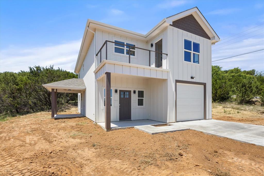 High-end finishes, thoughtful upgrades, and room to make it your own—this two-story home in the highly sought-after Mountain Lakes community in Bluff Dale checks all the boxes. Inside, you’ll find warm Pergo flooring, soft-close plywood cabinetry, abundant storage with multiple pantry spaces, and elevated touches throughout like bidets, a water softener system, and a beautifully designed kitchen with a farmhouse sink. Dual AC units keep both levels comfortable year-round, while a lighted stairway adds a custom feel. The true standout, though, is the 276 sq ft heated and cooled garage—far more than just a place to park. This fully conditioned space offers incredible flexibility, whether you need a private home office, game room, workout space, or even an additional bedroom. It’s a rare feature that gives you the freedom to adapt the home to your lifestyle. And with plenty of acreage to work with, you also have the option to add a carport or additional structure for covered parking, keeping this space fully dedicated to whatever you envision. The primary suite offers its own retreat with a coffee bar finished in butcher block and access to a private balcony with views for miles. Set on almost 3.4 acres, there’s ample space to expand, build a shop, or simply enjoy the peaceful surroundings. Even your pets have their own built-in pet palace complete with a little door. With access to two private lakes, this move-in ready property offers the perfect blend of comfort, versatility, and lifestyle—plus an allowance for finishing touches like knobs, landscaping, backsplash, and more.