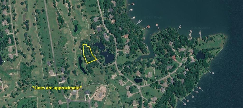 Discover the perfect blend of golf course living and lake life in the gated community of Lake Fork Golf Course Estates. Lots 63 and 64 offer a beautiful setting backing directly to the Par 3 Hole 2 with scattered mature trees and peaceful pond views from the front of the property. This quiet deed restricted neighborhood is ideal for building your custom dream home, vacation retreat, or retirement escape near world famous Lake Fork. Residents enjoy a private boat ramp with quick access to fishing, boating, and relaxing days on the water. Imagine mornings on the golf course, evenings by the lake, and the serenity of East Texas nature all around you. Rare opportunities like this in Lake Fork Golf Course Estates do not come along often.