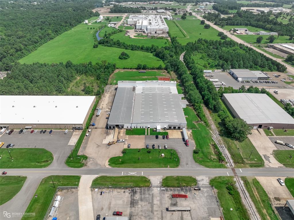 This 86,000 square foot, light industrial facility is situated on 6 acres. This attractive flex space offers limitless potential with ample space. The building features 5,865 square feet of impeccably designed office space and over 79,000 square feet of impressive warehouse space. Versatile loading options with grade level and dock high doors. 2 acres of the property could be used for outdoor storage or laydown. Advanced fire protection system. Capable of heavy electrical demands. Clear height of 23'4. Eave height of 17'11. Zoned I-2.