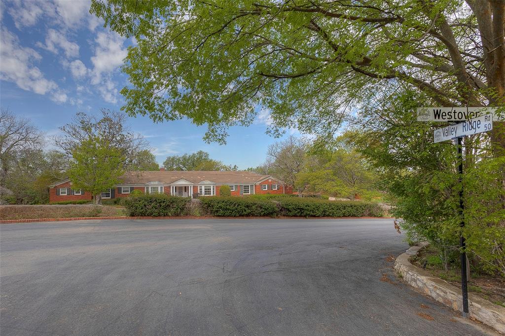 Located in the highly desirable enclave of Westover Hills sits 48 Valley Ridge Road. A rare opportunity awaits you here on this prestigious street. This substantial lot is almost 2 full acres sitting at the end of a very quiet street.  The current residence might be transformed or a completely new estate could be dreamed up. Ample space offers the new owner the chance to truly let their imagination run wild with a gentle downhill slope and many mature trees. All offers must be submitted by 12:00 PM April 22, 2024.