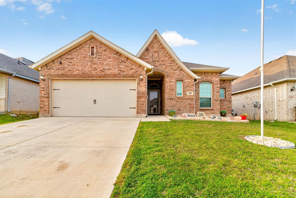 Welcome to 1445 Eagle Nest in Azle—where peaceful country living meets everyday convenience. Nestled on a spacious homesite, this 3-bedroom, 2-bathroom home offers the perfect blend of privacy, charm, and room to breathe.

Step inside to discover a warm and inviting layout filled with natural light, comfortable living spaces, and thoughtful design throughout. The kitchen serves as the heart of the home, offering ample cabinetry, generous counter space, and a seamless flow into the main living area—perfect for both entertaining and everyday living.

The primary suite provides a relaxing retreat with its own private bath, while the two additional bedrooms offer flexibility for family, guests, or a home office.

Outside, you’ll find plenty of space to enjoy Texas sunsets, host gatherings, or simply unwind in your own private setting.

Located just minutes from local dining, shopping, and schools, yet tucked away enough to enjoy the quiet lifestyle Azle is known for, this home truly offers the best of both worlds.

Whether you’re looking for your first home, room to grow, or a peaceful place to settle down—this one is a must-see.

Schedule your private showing today!