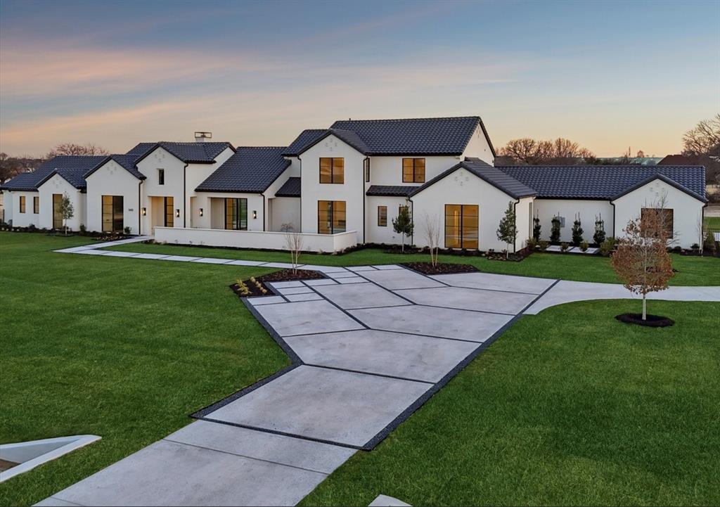 Discover the epitome of luxury living in Bartonville’s exclusive Eagle Ridge community, where elegance and sophistication meet in this 2026 Completion New Build by Stewart Custom Homes. Situated on a coveted  2+ acre lot, this exquisite estate is designed for those who appreciate the finest craftsmanship and unparalleled comfort. Boasting five private guest bedrooms, a secluded owner’s retreat with dual spa-inspired bathrooms and separate wardrobe closets, an exercise room, and a media & game room with a wet bar, every detail is curated for an extraordinary living experience. The chef’s kitchen, complete with a prep kitchen, flows seamlessly into the dining area and wine room, while the family room with a fireplace opens to multiple patios, creating the ultimate indoor-outdoor retreat. Designed for both relaxation and entertaining, this estate features an outdoor kitchen, outdoor fireplace, and ample space for a future pool. A private study, a four-car garage, and the option to accommodate horses further enhance this home’s versatility. Beyond your private sanctuary, Eagle Ridge offers tranquil scenic ponds, perfect for relaxation or recreation. Families will appreciate access to prestigious schools such as Argyle ISD & Liberty Christian School, ensuring exceptional education opportunities. Indulge in the convenience of nearby dining at Marty B’s, tee off at Denton Country Club or Lantana Golf Club, and enjoy easy access to Lake Lewisville and Grapevine Lake for water enthusiasts. With equestrian-friendly options and a lifestyle tailored to discerning tastes, this is more than a home—it’s a legacy. Welcome home to Bartonville’s most sought-after community.