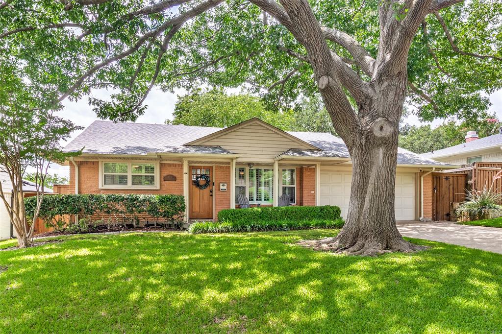 Tucked into the heart of Lake Highlands among the coveted L Streets, this thoughtfully renovated ranch blends timeless neighborhood charm with modern comfort. Reimagined living spaces create an open, airy flow filled with natural light from every angle. At the center of the home, the beautifully updated kitchen features custom cabinetry, built-in organization, a spacious island, and a full Bosch appliance suite. Two renovated bathrooms offer updated vanities and designer lighting, including a Jack-and-Jill bath connecting the secondary bedrooms. The three-bedroom layout is both functional and private, highlighted by a generously sized primary suite tucked quietly at the rear of the home. The eat-in kitchen opens seamlessly to a sizable patio overlooking an expansive, private backyard with endless possibilities for entertaining, play, or future enhancements. All of this in one of Dallas’ most beloved neighborhoods, just moments from White Rock Lake, scenic parks and trails, and the everyday conveniences that make Lake Highlands such a sought-after place to call home.