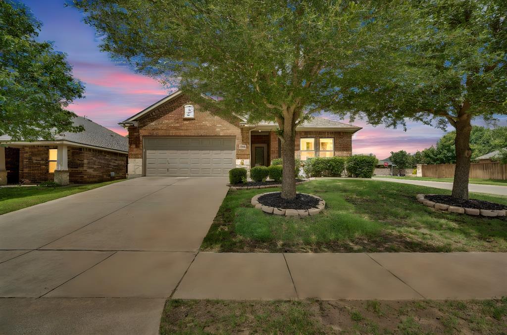 3 bedroom 2 baths home on a spacious corner lot in the desirable garden valley neighborhood! Beautifully upgraded with hand scraped hardwood floors and knotty alder cabinets! Get a discount with your insurance with this 30-year roof just replaced in 2025! The open-concept floor-plan makes the home feel spacious and welcoming while maintaining a warm and inviting atmosphere. The kitchen is the heart of the home with an island that flows naturally into the living room. The kitchen features granite countertops, stainless steel appliances, a pantry and plenty of room for cooking and entertaining.  The dining room has a dedicated space for gathering around the table for meals, holidays, and game time.  Move into the primary bedroom which offers a nice private space with an ensuite bathroom equipped with separate shower and bathtub areas as well as dual vanities and a water closet. Spacious walk-in closet with built ins. Step out onto the covered back patio that overlooks the peaceful, spacious backyard with its own sprinkler system and wooden privacy fence. This is a great space to entertain guests and hide away from the business of the day to day. Neighborhood park and sidewalks for active living. Close to HEB, Target, restaurants and more! Only 30 minutes to downtown Dallas! Come see for yourself and make this your very own home!
