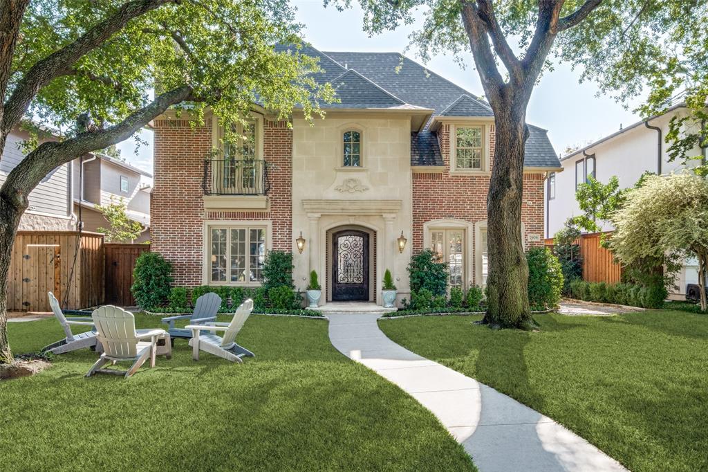 Experience the perfect blend of elegance and comfort in this inviting home that combines modern charm with family-friendly practicality, offering a spacious layout and open floor plan. As you enter, you're greeted by a grand curved staircase leading to the heart of the home. The formal lounge area with a beautiful fireplace is ideal for entertaining and seamlessly transitions to the formal dining room, featuring walls of windows that flood the space with natural light.

The chef's kitchen is a culinary dream, equipped with a built-in refrigerator, two sinks, a warming drawer, and a six-burner gas cooktop. It opens to a large family room, complete with a cozy fireplace, beautiful built-ins, and views of the sparkling pool and patio. The first floor also includes a handsome study, perfect for a home office, and a convenient powder bath.

Upstairs, the spacious primary suite offers a tranquil escape with a private balcony—perfect for enjoying a morning cup of coffee. The luxurious bath features dual vanities, a jetted tub, a separate shower, and a generous walk-in closet. There are three additional bedrooms and baths, along with two work centers ideal for remote work or homework. The fun continues in an amazing game room with a wet bar and a full bath. A convenient second staircase also provides easy access between the floors.

The backyard is an oasis for relaxation and entertainment, featuring a pool, spa, grill, and outdoor fireplace. A separate side yard with lush turf provides additional space for play and leisure. Embrace the allure and convenience of a home that perfectly balances comfort and sophistication!