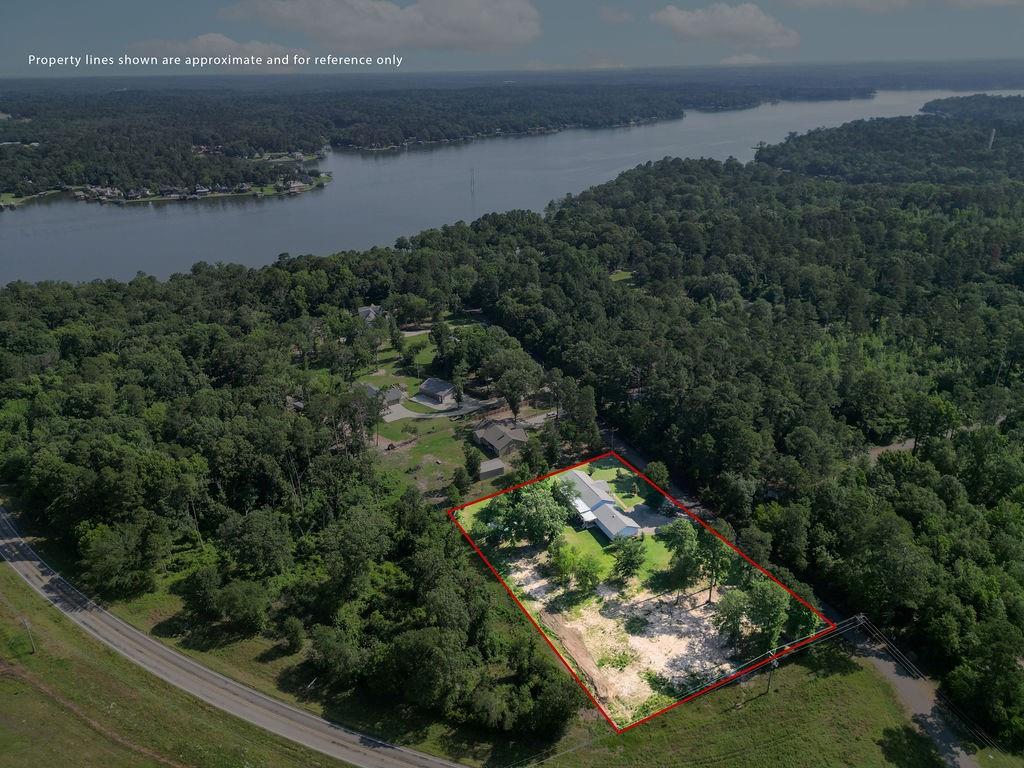 Conveniently located near Cypress Springs Lake and approximately 15 minutes from Lake Bob Sandlin State Park, this 3 bedroom, 2 bath pier and beam home offers the opportunity to enjoy East Texas living with room to spread out on 2 acres just outside the city limits and within Mt. Vernon ISD.

Inside, the split floor plan provides privacy for the primary suite, which features double vanities, a soaking tub, and two walk in closets. Vinyl plank flooring runs throughout much of the home, while the spacious living room showcases an exposed beam that adds character and complements the home's design.

The kitchen is equipped with stainless steel appliances, a stainless farmhouse sink, and opens to the dining area, creating a functional layout for both everyday living and entertaining. French doors lead to a covered back porch overlooking the backyard and wooded surroundings.

Outside, there is plenty of space for gardening, chickens, small animals, recreational activities, or future improvements. The 28 x 40 four car garage offers substantial parking and storage, while the heated and cooled interior workroom provides a versatile space that could serve as a workshop, hobby room, home office, craft room, or fitness area.

Additional features include a storage building with plumbing already in place and a 20 x 20 slab ready for expansion or future use.

Whether you're looking for a full time residence, a place with room for hobbies, or a property close to some of East Texas' most popular lakes, this home offers flexibility, functionality, and a location that puts outdoor recreation within easy reach.