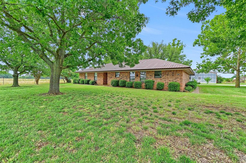 Discover the perfect blend of peaceful country living and future potential with this beautiful 13.97-acre property located just north of Gunter and near the established Hidden Lakes subdivision. Offering plenty of space to spread out, this property provides a rare opportunity to enjoy acreage living within one of North Texas' most desirable and rapidly growing communities. The property features a well-maintained 1985 brick home offering 1,671 square feet with 3 bedrooms and 2 bathrooms, making it ideal as a primary residence, guest home, or investment opportunity. The surrounding acreage is currently under agricultural valuation with open pasture and cattle grazing, creating a true country atmosphere with endless possibilities. With over 800 feet of road frontage, the property offers easy access while maintaining privacy and flexibility for future improvements. Whether you're dreaming of a family estate, horse property, hobby farm, or simply a place to enjoy wide-open spaces, this property provides the perfect canvas. Located within highly sought-after Gunter ISD and just minutes from schools, shopping, dining, and the continued growth throughout North Texas, this property delivers the best of both worlds—peaceful rural living with convenient access to modern amenities.