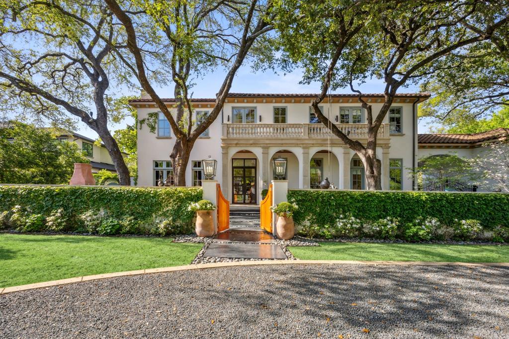 Nestled in the heart of Preston Hollow, this exceptional residence blends timeless architecture with refined modern luxury. Originally built by acclaimed builder Susan Newell, the home underwent a complete renovation in 2020—once again led by Newell—resulting in a sophisticated transformation inside and out. Every detail was thoughtfully reimagined, with no expense spared. The renovation included all-new systems, including HVAC and tankless water heaters, delivering enhanced comfort and energy efficiency. Fresh stucco, updated paint, and professionally designed landscaping create stunning curb appeal, while newly added exterior walls, a custom brick courtyard with fountain, and two gas fireplaces elevate the outdoor living experience. Designed for both relaxation and entertaining, the backyard features a resort-style pool, outdoor kitchen, and convenient outdoor shower. Inside, rich pecan wood floors run throughout the home, complementing the beautifully redesigned interiors. The chef’s kitchen is a true centerpiece, showcasing premium appliances, designer finishes, and generous gathering space. The expansive primary suite offers a peaceful retreat with luxurious touches and a spa-inspired bath. With five spacious bedrooms, five full and three half baths, plus a game room, this remarkable home delivers comfort, elegance, and elevated living at every turn.
